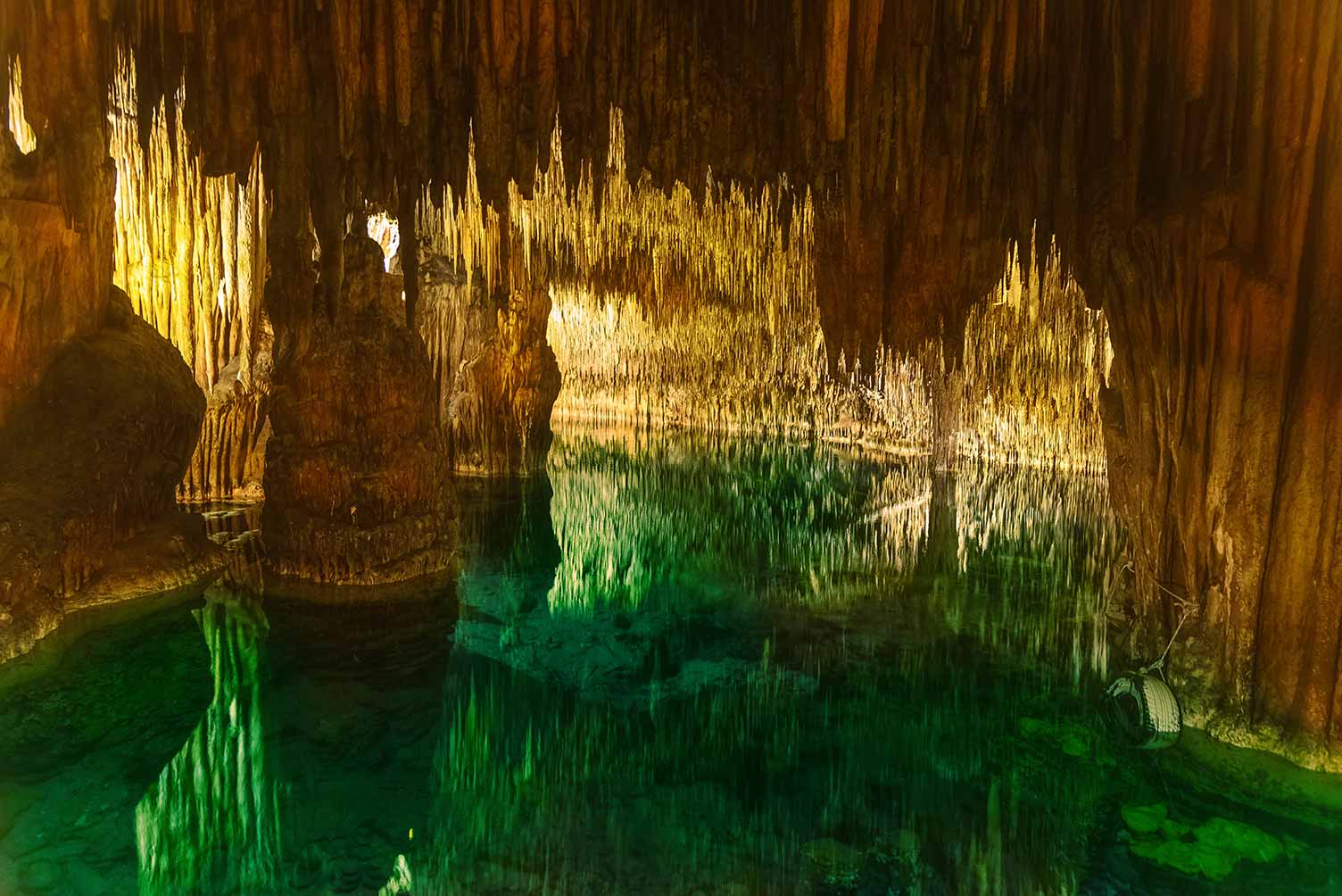 Drach Caves boat tour, green water and stalactites