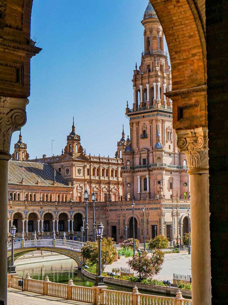 looking at main building of Plaza de Espana from underneath one of the arches.