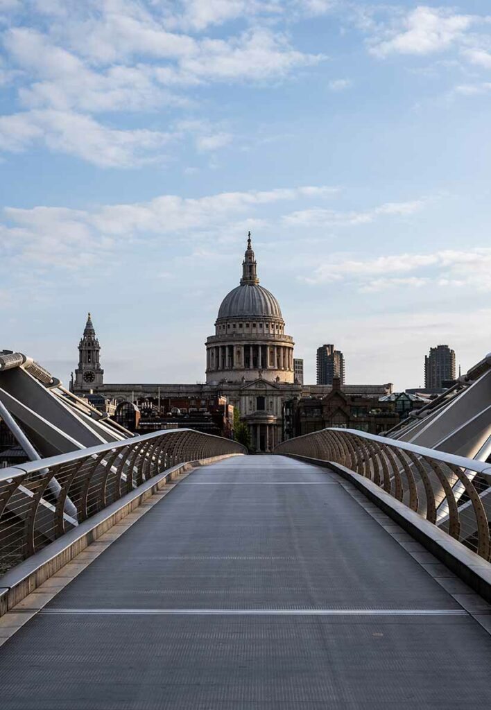 st pauls cathedral london viewed from the end of millenium bridge at sunrise