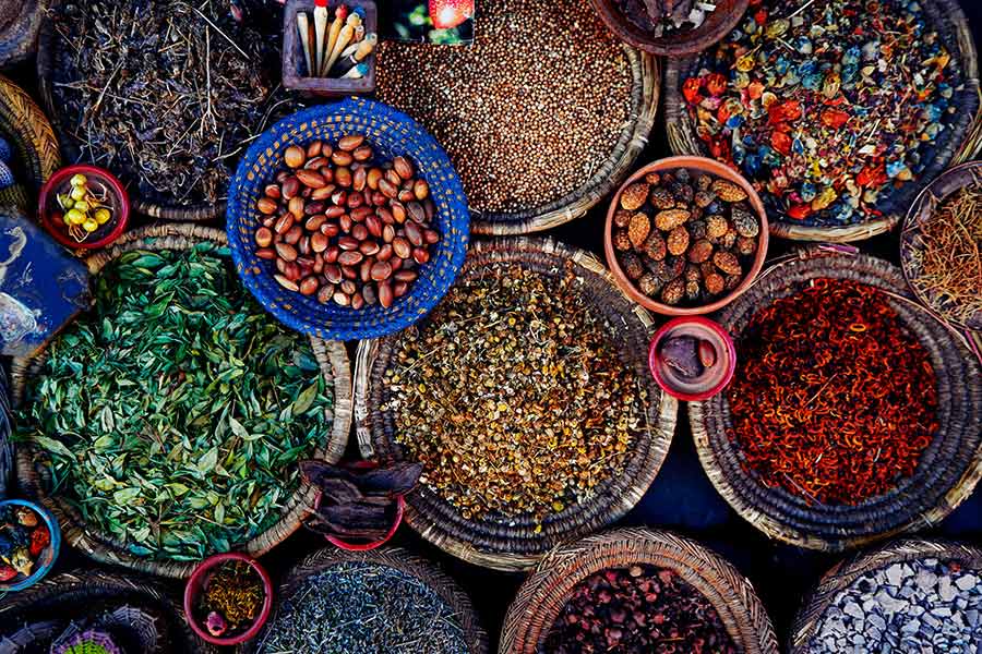 view overlooking basket of Moroccan Street Market, Spices, Morcco